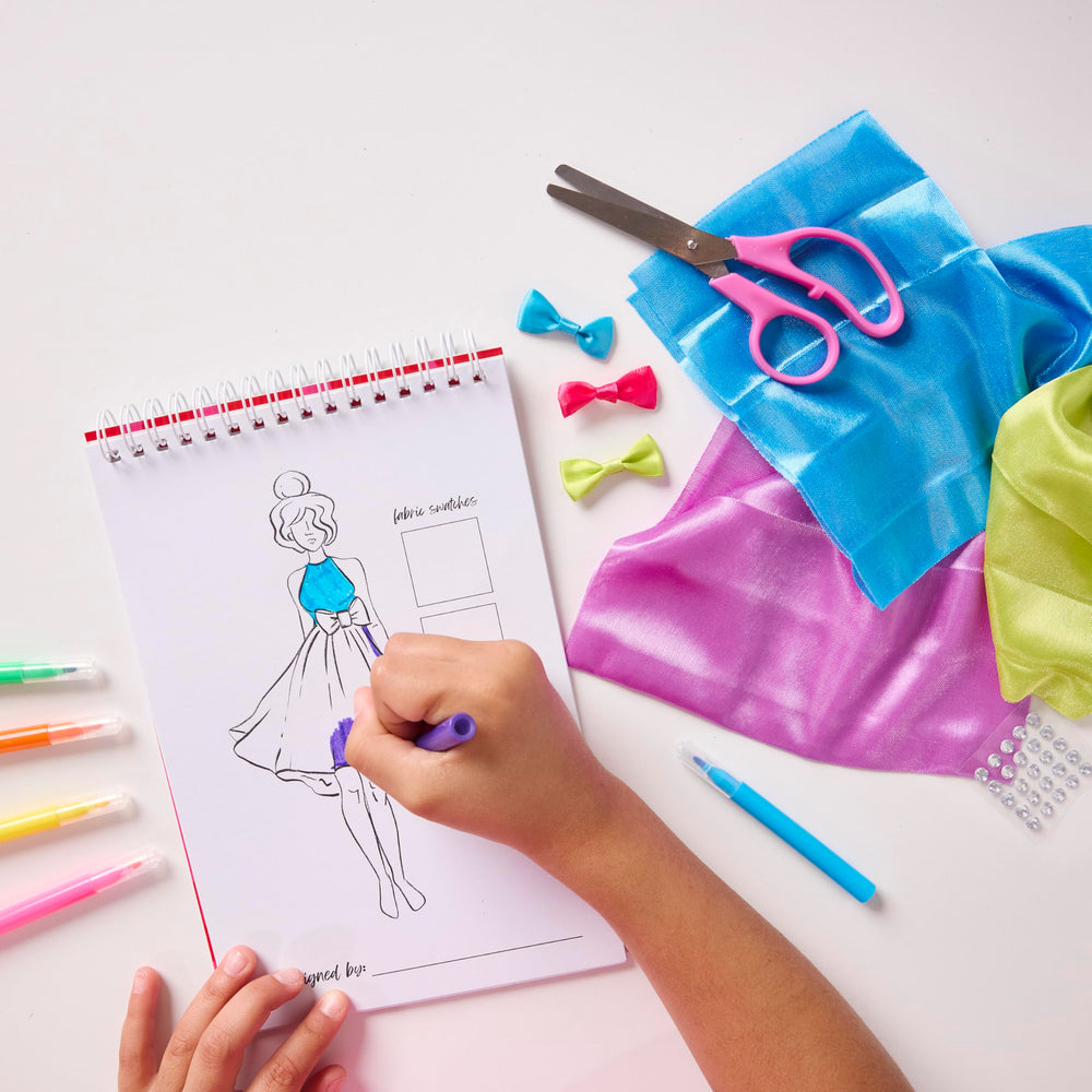 Creativity for Kids Design by You Fashion Studio garment bag protects and displays finished pieces.