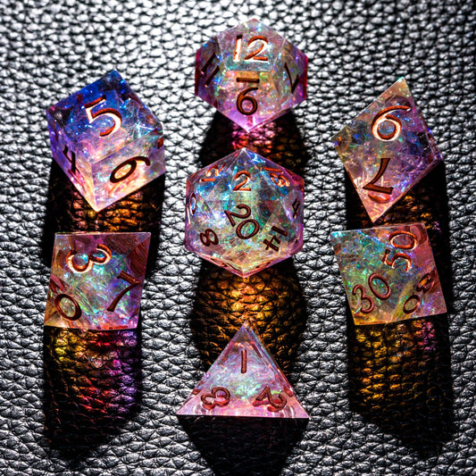 CRITALLIC 7-piece DND dice set close-up highlights transparent sharp edges and vivid purple-orange hues.