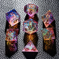 CRITALLIC 7-piece DND dice set close-up highlights transparent sharp edges and vivid purple-orange hues.