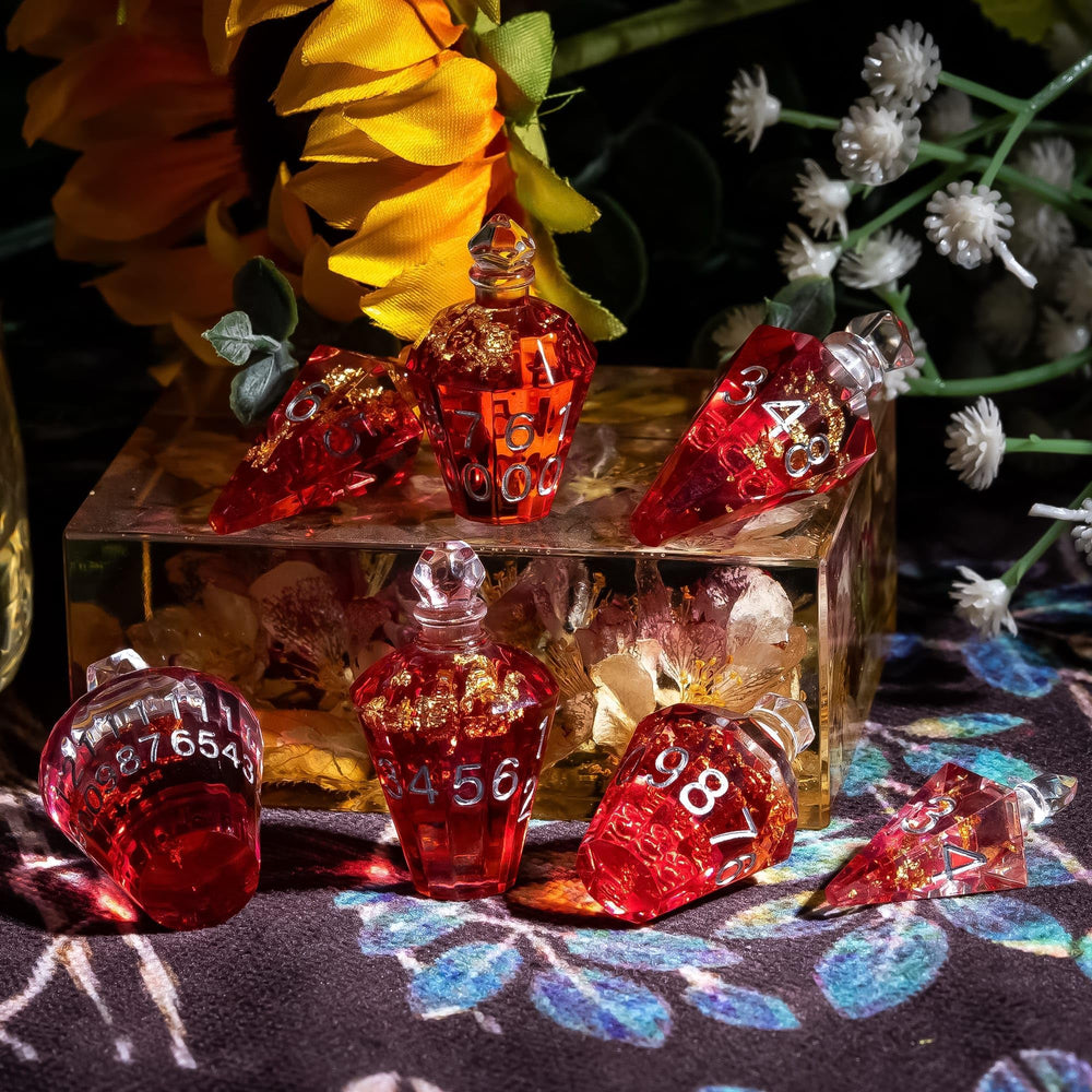 CRITALLIC transparent red dice bottle catches light beautifully.
