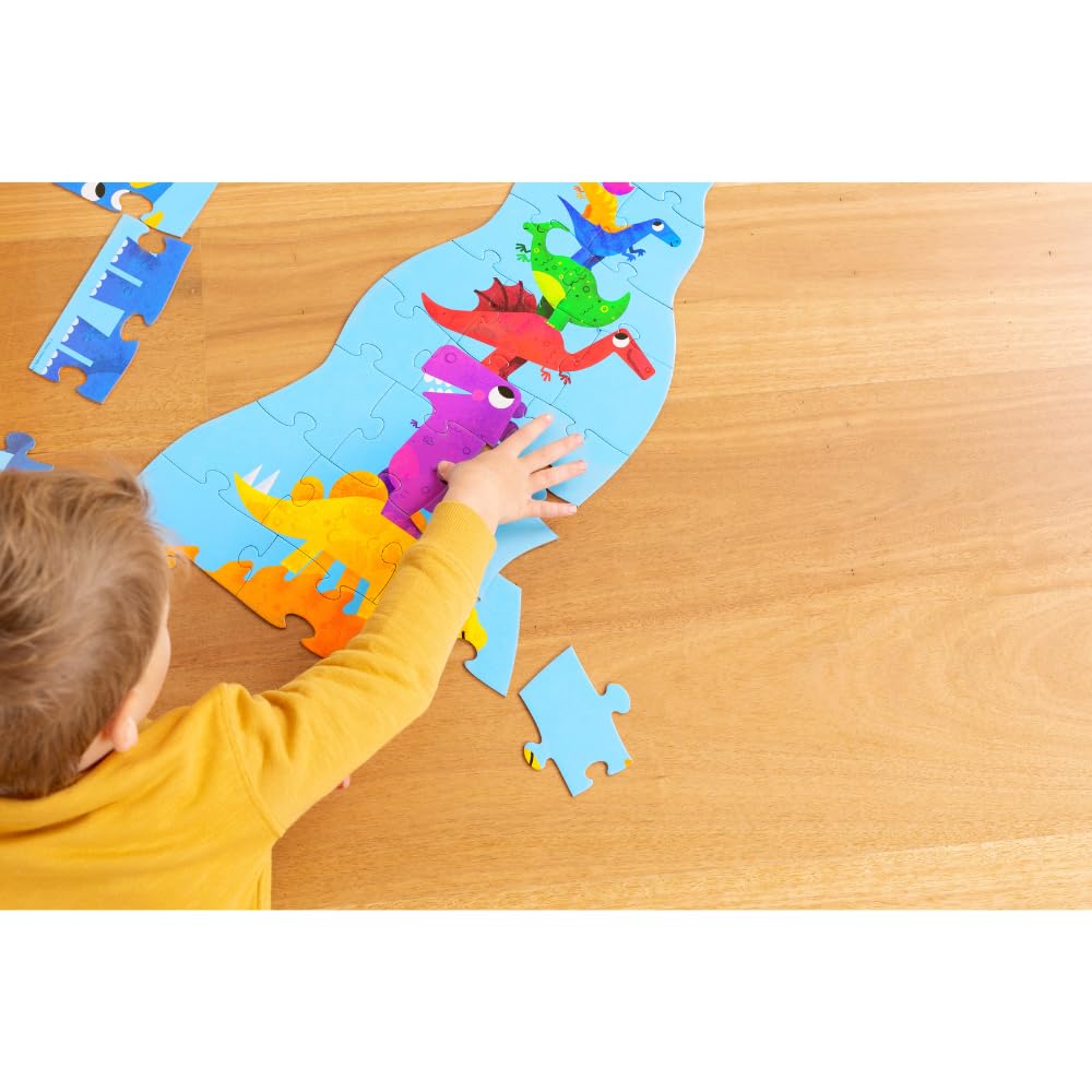 Crocodile Creek child playing dinosaur puzzle supports fine motor skills