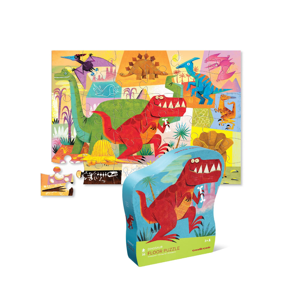 Crocodile Creek dinosaur puzzle-36-piece assembled on the floor supports early problem-solving and spatial awareness.
