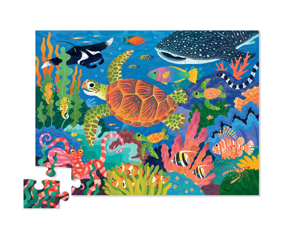Crocodile Creek kids hands assembling: puzzle play helps refine fine motor skills.