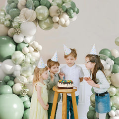CROSSFINGERS balloon arch kit backdrop creates a dreamy wedding or celebration photo setting.