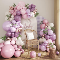CROSSFINGERS dusty purple balloon arch kit assembled for an elegant event.