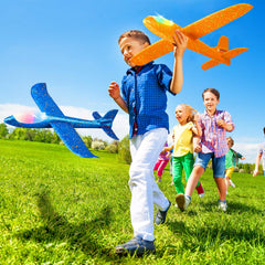 CUKU LED Airplane children playing outdoors with vivid planes.