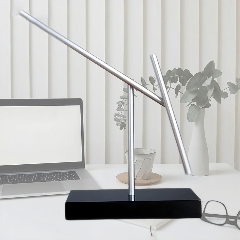 CulinaryEdge kinetic energy pendulum in office environment enhances subtle ambiance.