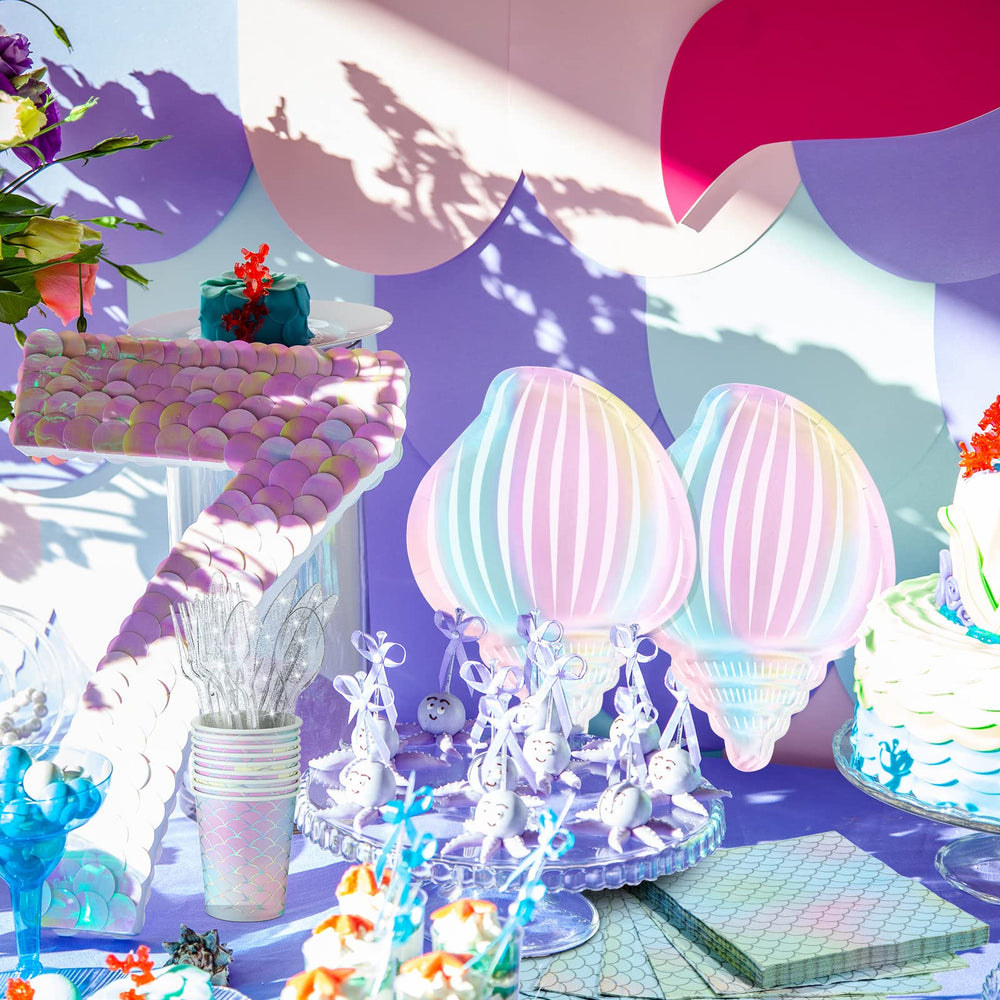 Cunhill Mermaid scale cups reflect color and add festive drink setup.