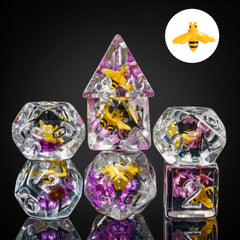 Cusdie dice close-up; bee in purple flower interior seen through transparent resin