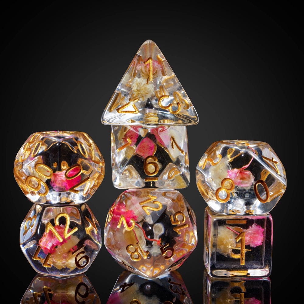 Cusdie seven-die DND dice filled with rose petals for captivating sessions.