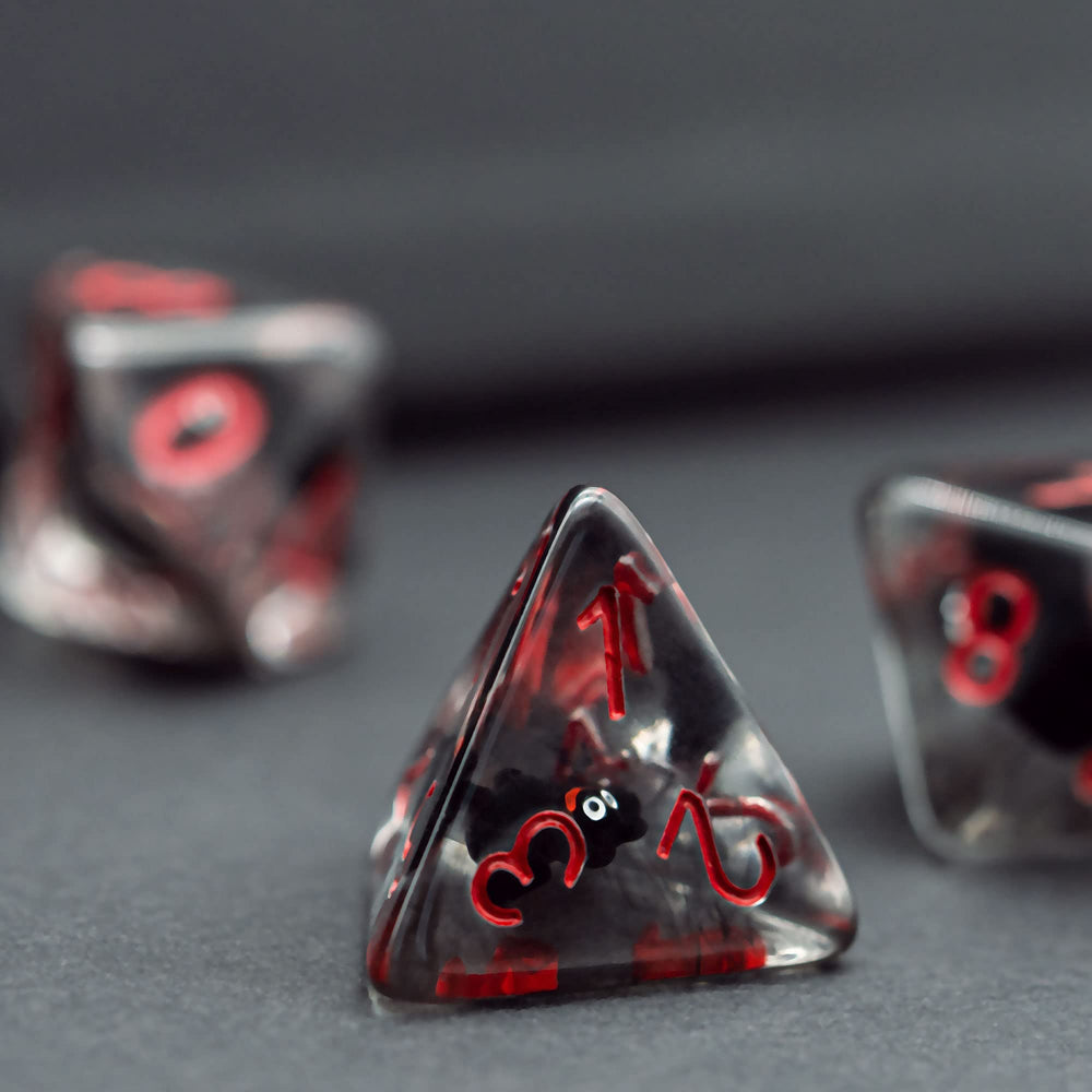 Cusdie DND dice set with bold red numerals on clear resin