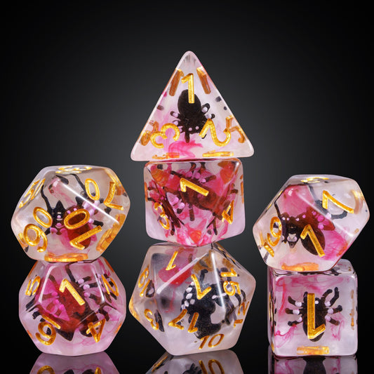 Cusdie seven-die DND set with black spider in red mist, elevating table presence.