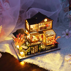 CUTEBEE dollhouse with LED light adds warm ambiance to miniature scenes.