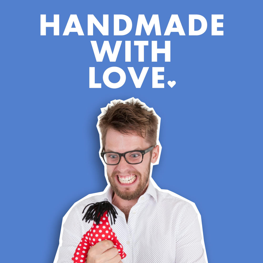 Dammit Doll front features stitched poem, adding attitude and quirky charm.