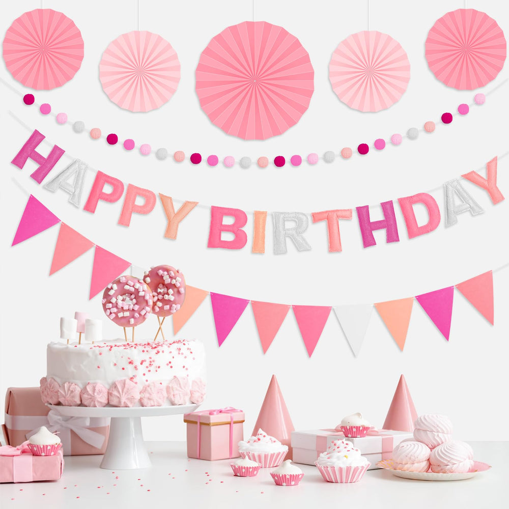 Danadia pink felt pom-poms add soft color and texture to any party display.