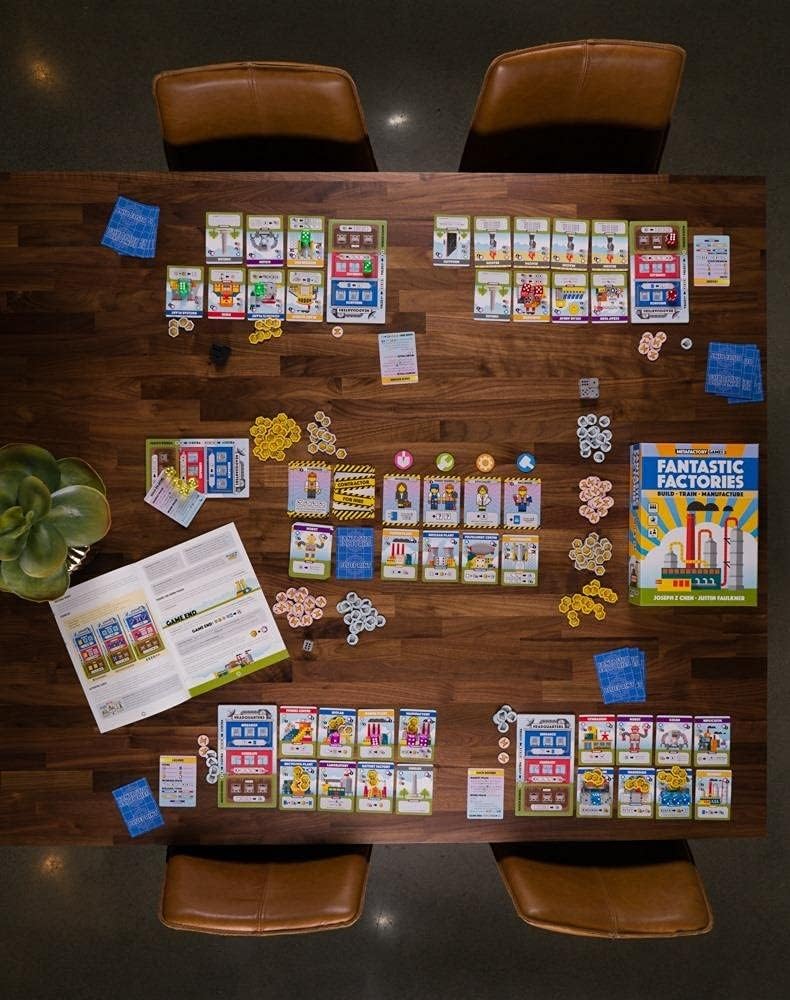 Deep Water Games' Fantastic Factories: dice workers setup demonstrates resource allocation.