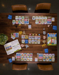 Deep Water Games' Fantastic Factories: dice workers setup demonstrates resource allocation.