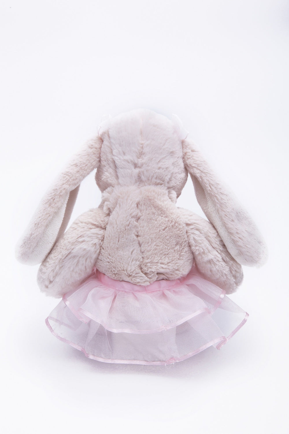 DILLY DUDU Plush Bunny with decorative bow adds a cute room touch.