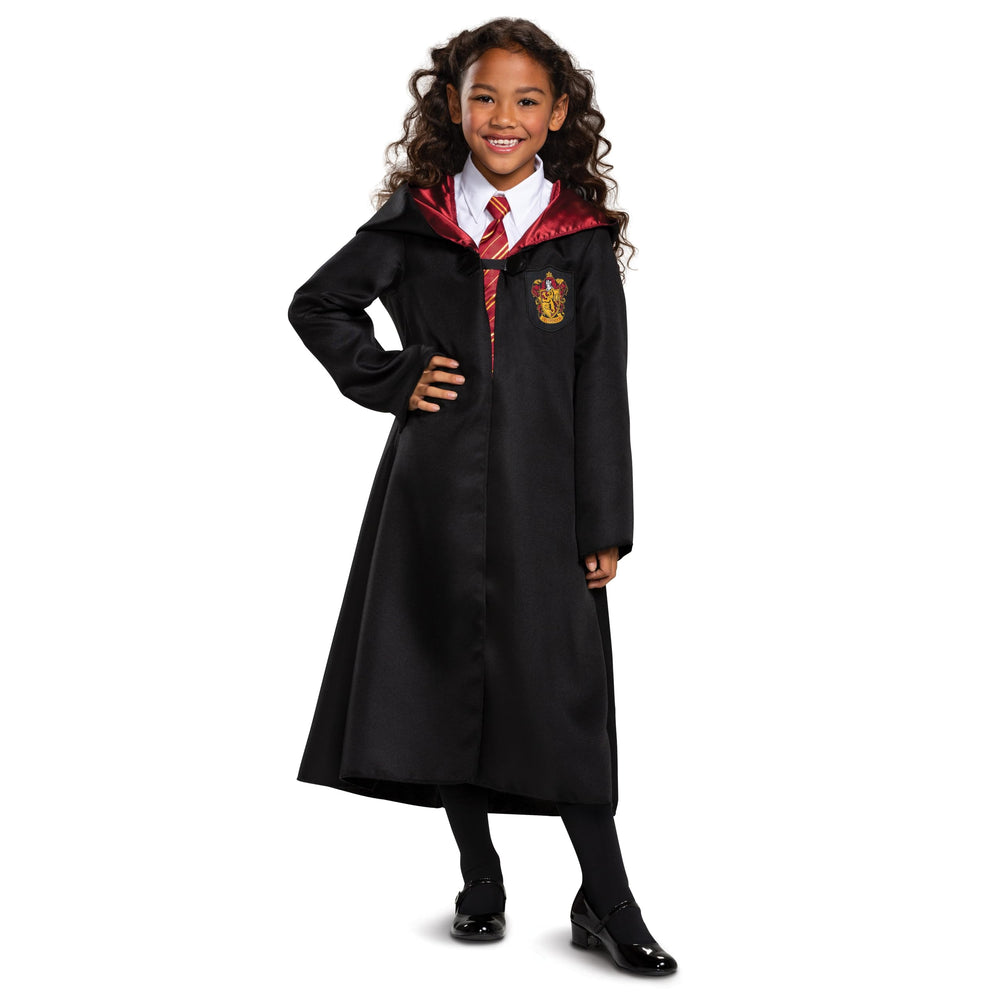 Kids wearing Gryffindor robe during pretend play with Disguise costume.