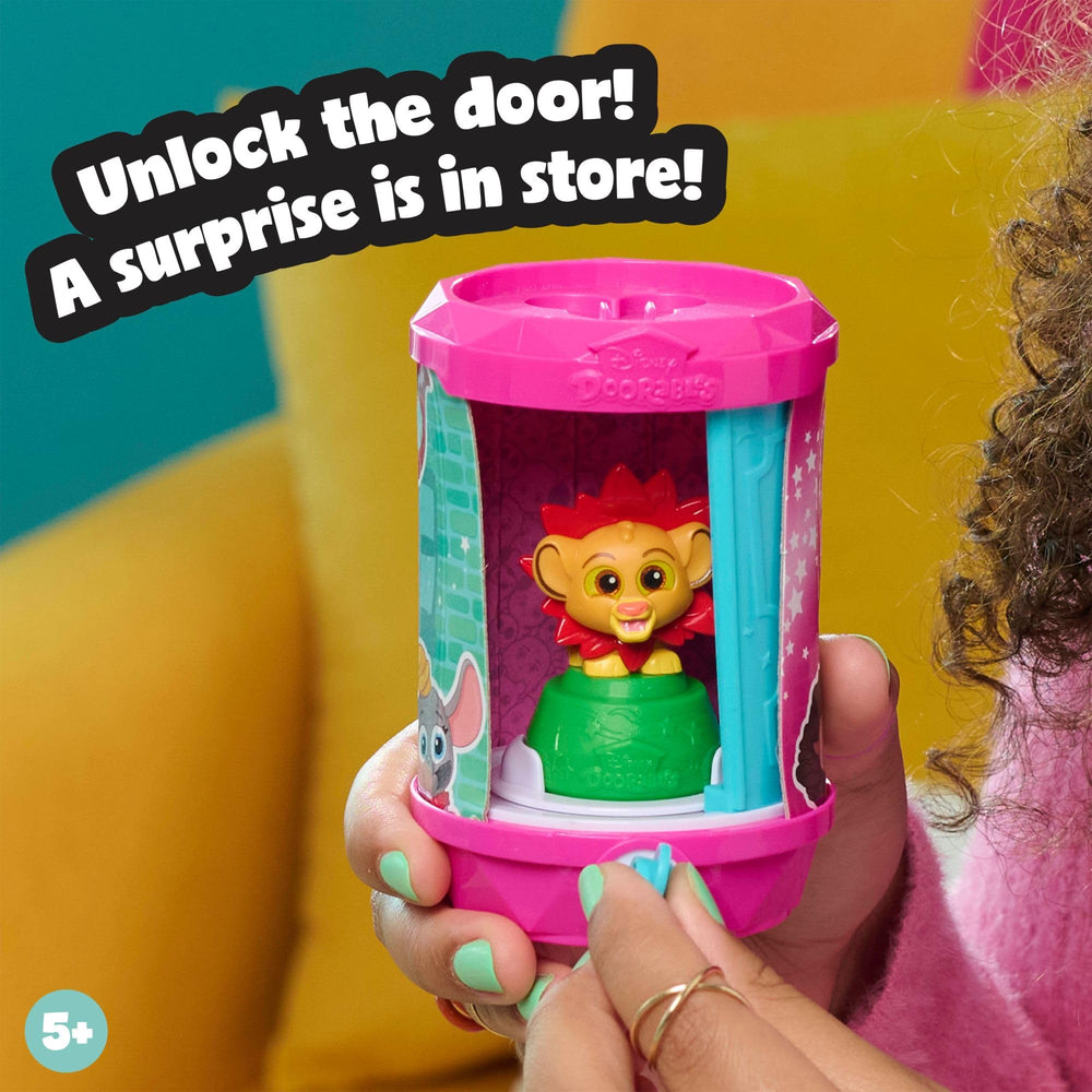 Disney Doorables figure moving on palm for tactile, interactive play.