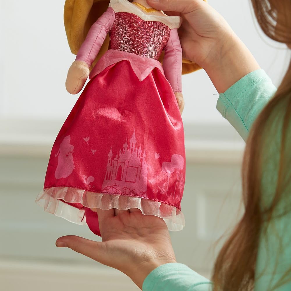 Golden trims and hair ribbon on Aurora plush enhance Disney Princess collection