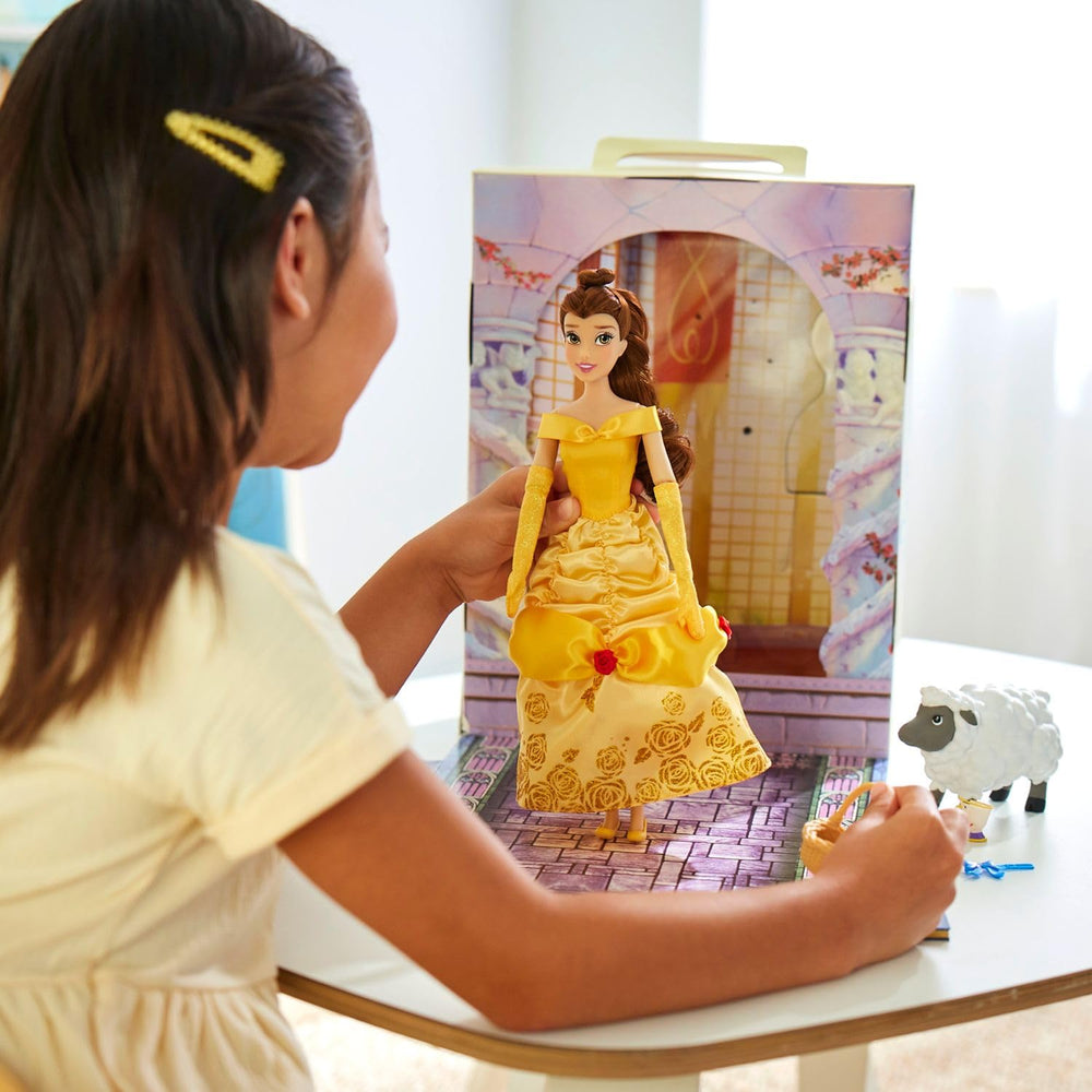 Belle wearing blue satin dress with pink apron for versatile play scenarios.