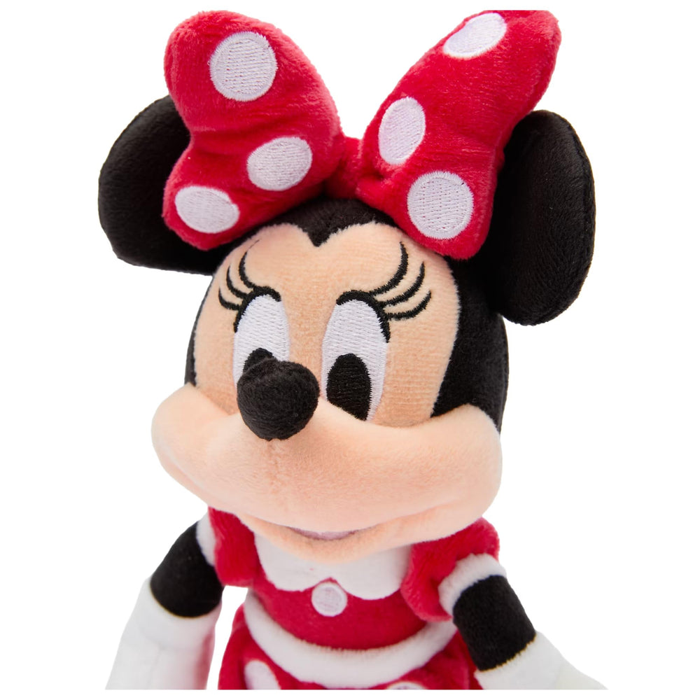 Detailed sculpting and soft fabric make this Minnie Mouse plush delightful