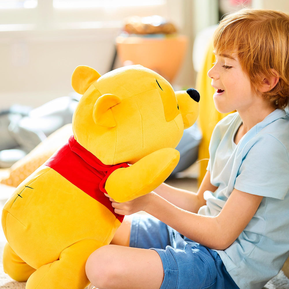 Embroidered features capture Pooh's facial details for an authentic Disney collectible feel.