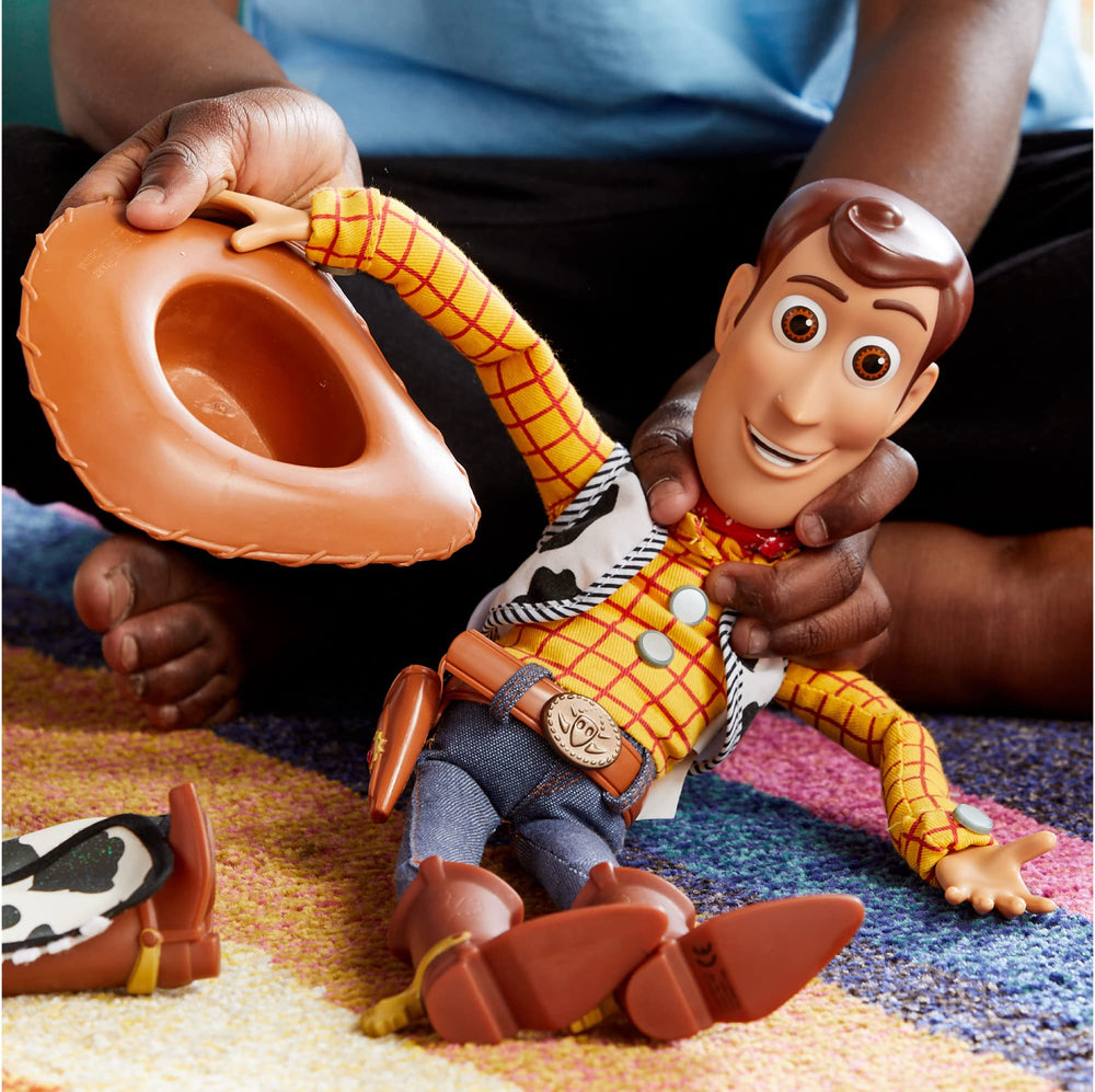Disney Store Woody interacts with nearby figures for dynamic scenes