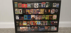 DisplayGifts display case with lip-edged shelves prevents decks from sliding.