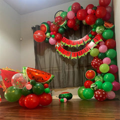 DNBOD Red polka dot latex balloons add playful detail.