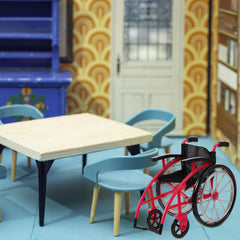 DOITOOL dollhouse wheelchair figurine adds authentic touch to miniature interiors.