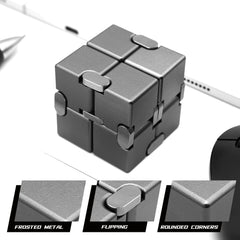 DOLASEV Infinity Cube on a desk setup to aid focus