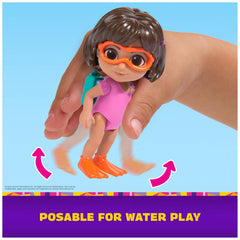 Boots goggles and green floaties support cooperative pool-time play.