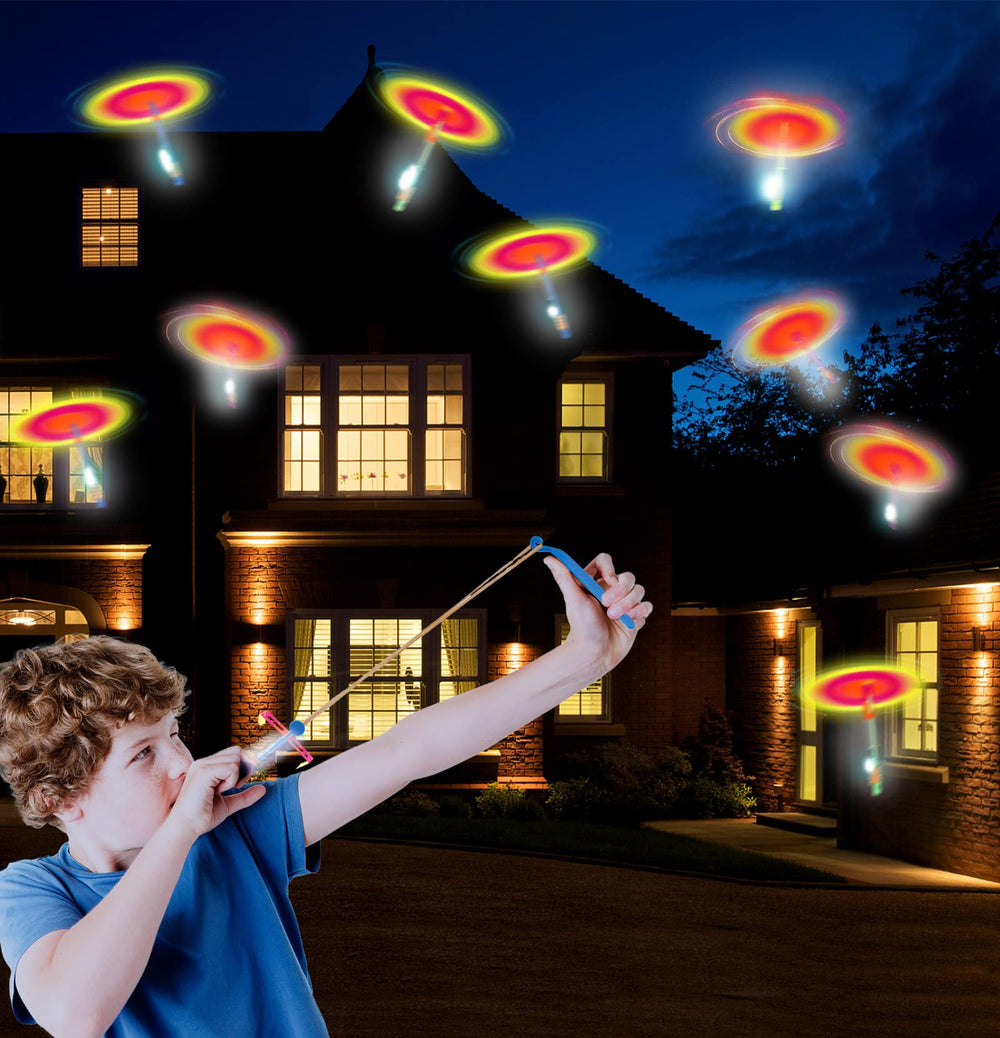 Dossini LED Arrow Helicopter kids playing and teamwork in a backyard game.