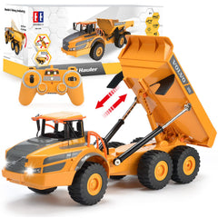 DOUBLE E Volvo RC dump truck in payload action for interactive construction play.