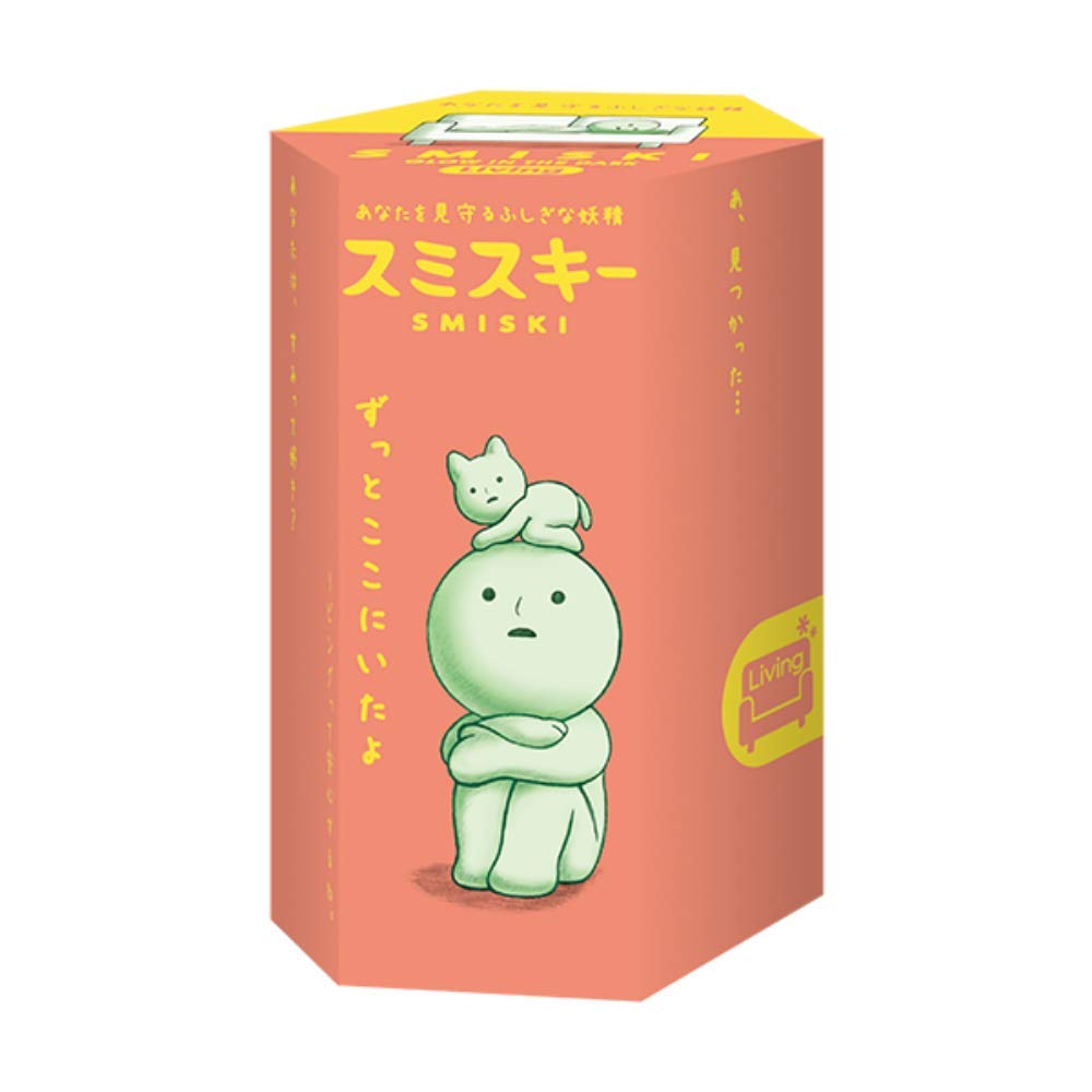 Dreams Smiski glow-in-the-dark figure glowing softly on a nightstand.