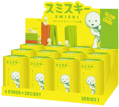 Dreams Smiski glow-in-the-dark figure illuminates night shelves with a subtle glow.