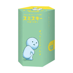 Dreams Smiski Toilet Series glow figure glows in the dark on a shelf.