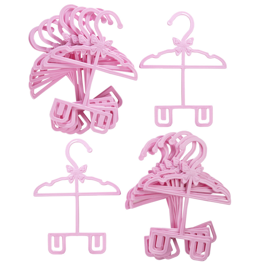 Dress Along Dolly 18-inch doll clothes hanger in use for outfits