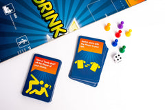 Drinkopoly tokens, dice, and cards enable bold party challenges.