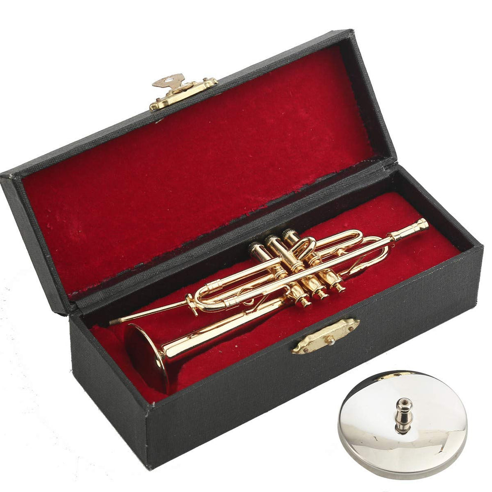 Dselvgvu brass miniature trumpet with gold plating enhances room decor.