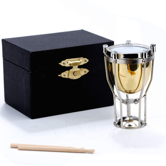 Dselvgvu miniature timpani brass close-up highlights craftsmanship for collectors.