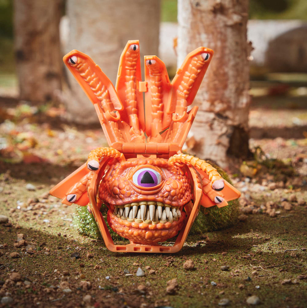 Beholder Dicelings shown in ready-to-display pose on a shelf.