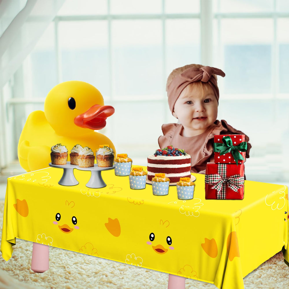 Dydamud yellow duckie tablecloth set up for an outdoor picnic.