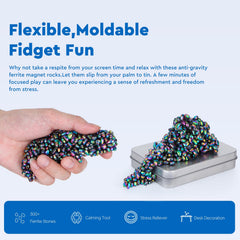 DYRDM ferrite putty in hand, a portable fidget tool for breaks.