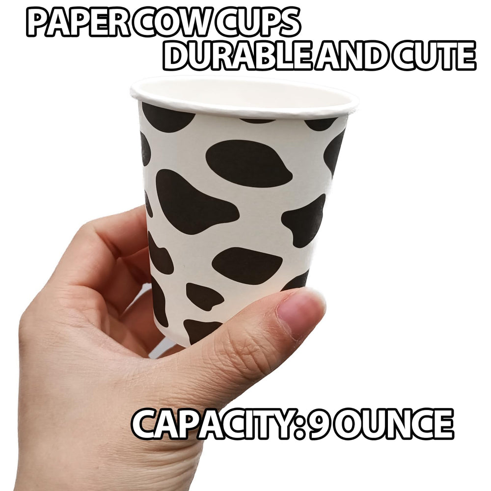 Closeup of cow pattern cups showing crisp print and sturdy paper.
