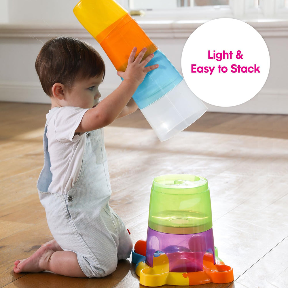 Edushape Stack & Drop Tower: tactile textures invite sensory exploration during play.
