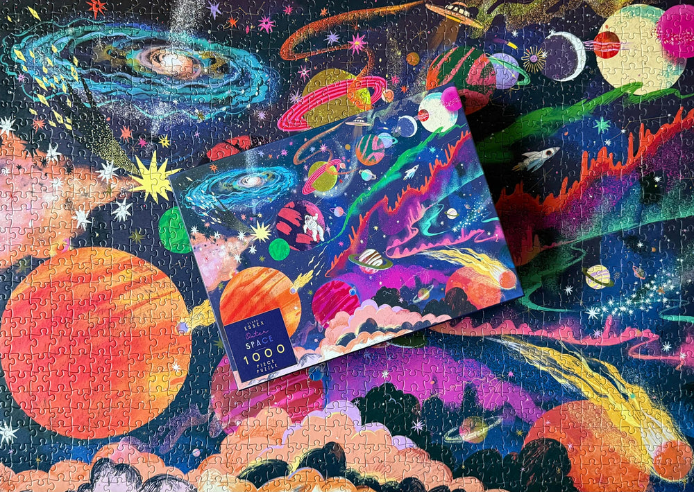 Elena Essex outer-space puzzle packaging: recycled materials support eco-friendly crafting.
