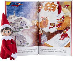 The Elf on the Shelf Christmas tradition book accompanying the blue-eyed elf for storytelling